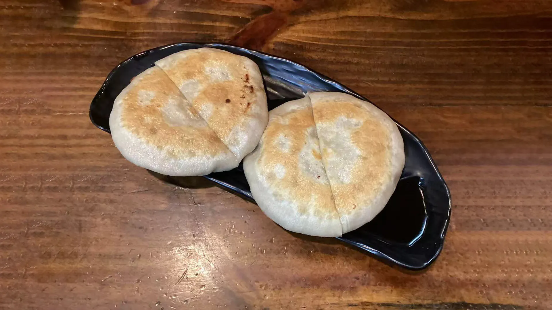 Two tender beef stuffed pancakes at Noodle Man，a Chinese Restaurant in Virginia Beach