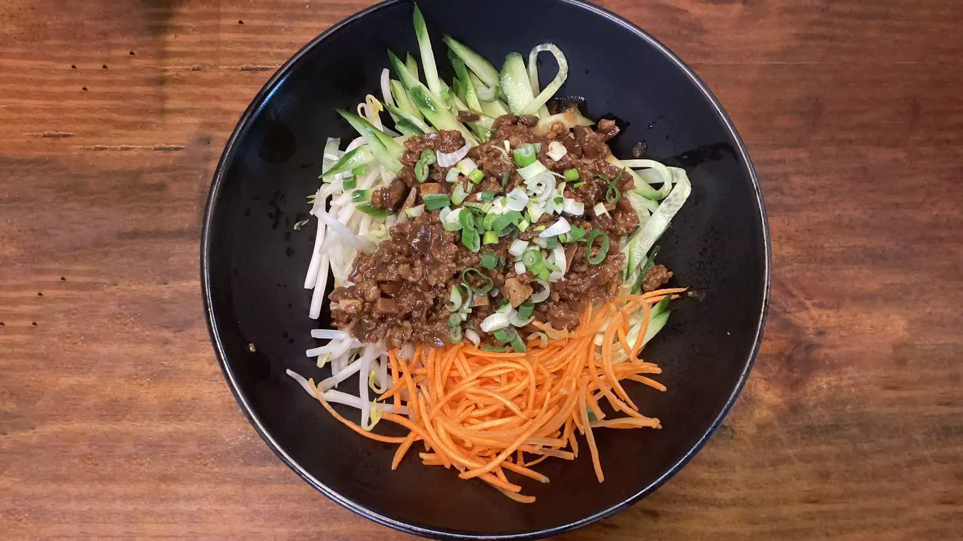 Savory traditional chow chiang mein tossed with fresh shredded veggies at Noodle Man，a Chinese Restaurant in Virginia Beach