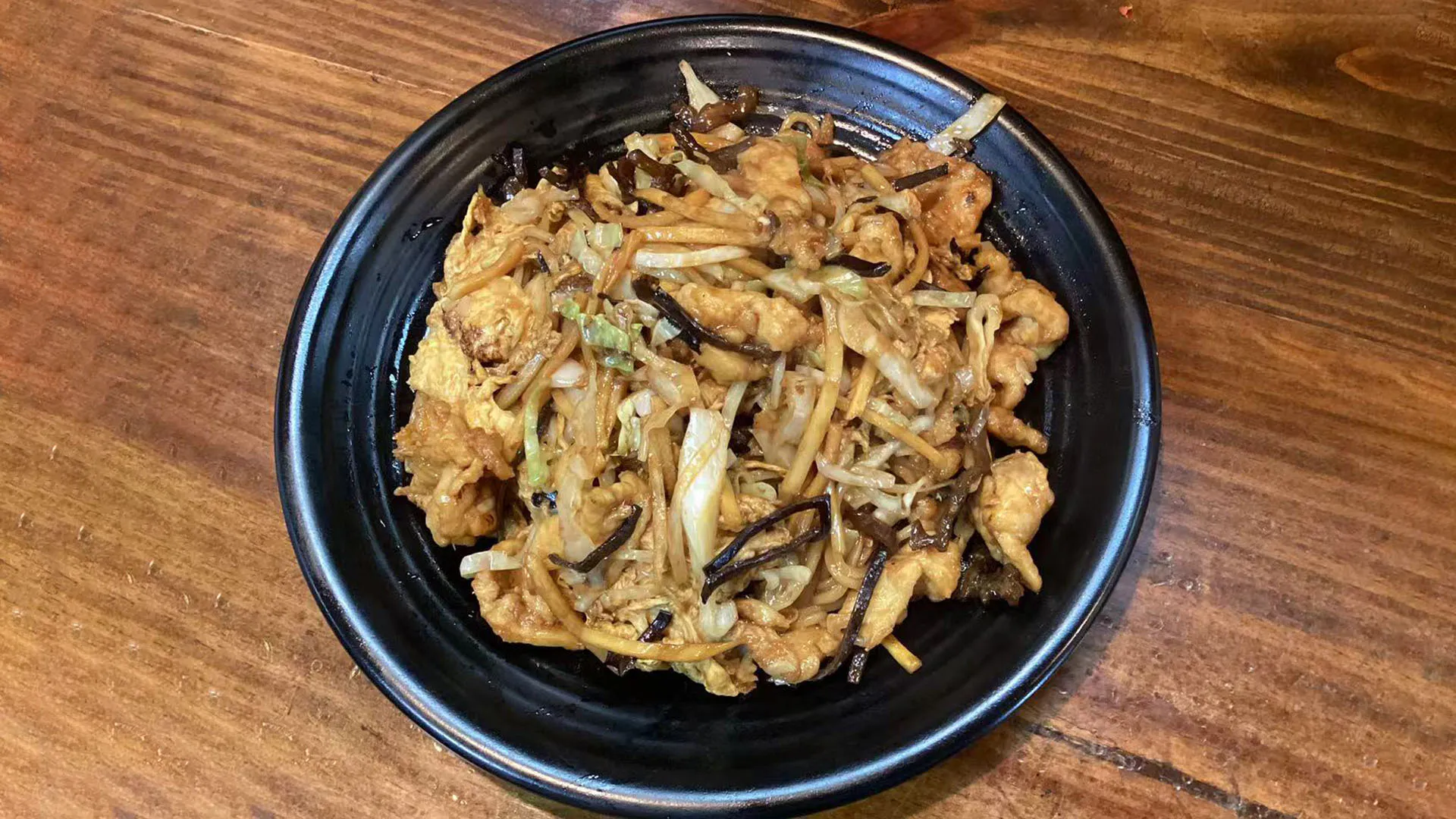 Well-seasoned mushu chicken stir-fried noodle with mixed ingredients at Noodle Man，a Chinese Restaurant in Virginia Beach